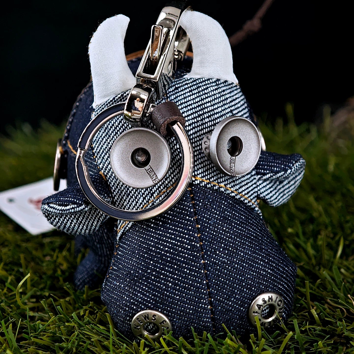 Gothic miniature ox in deep indigo fabric with contrast stitching. Dark artisan folk art, macabre collectible keychain.