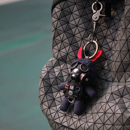 Dark gothic bunny in gas mask with chrome breathing apparatus and black textile. Artisan macabre art toy, dark designer collectible.