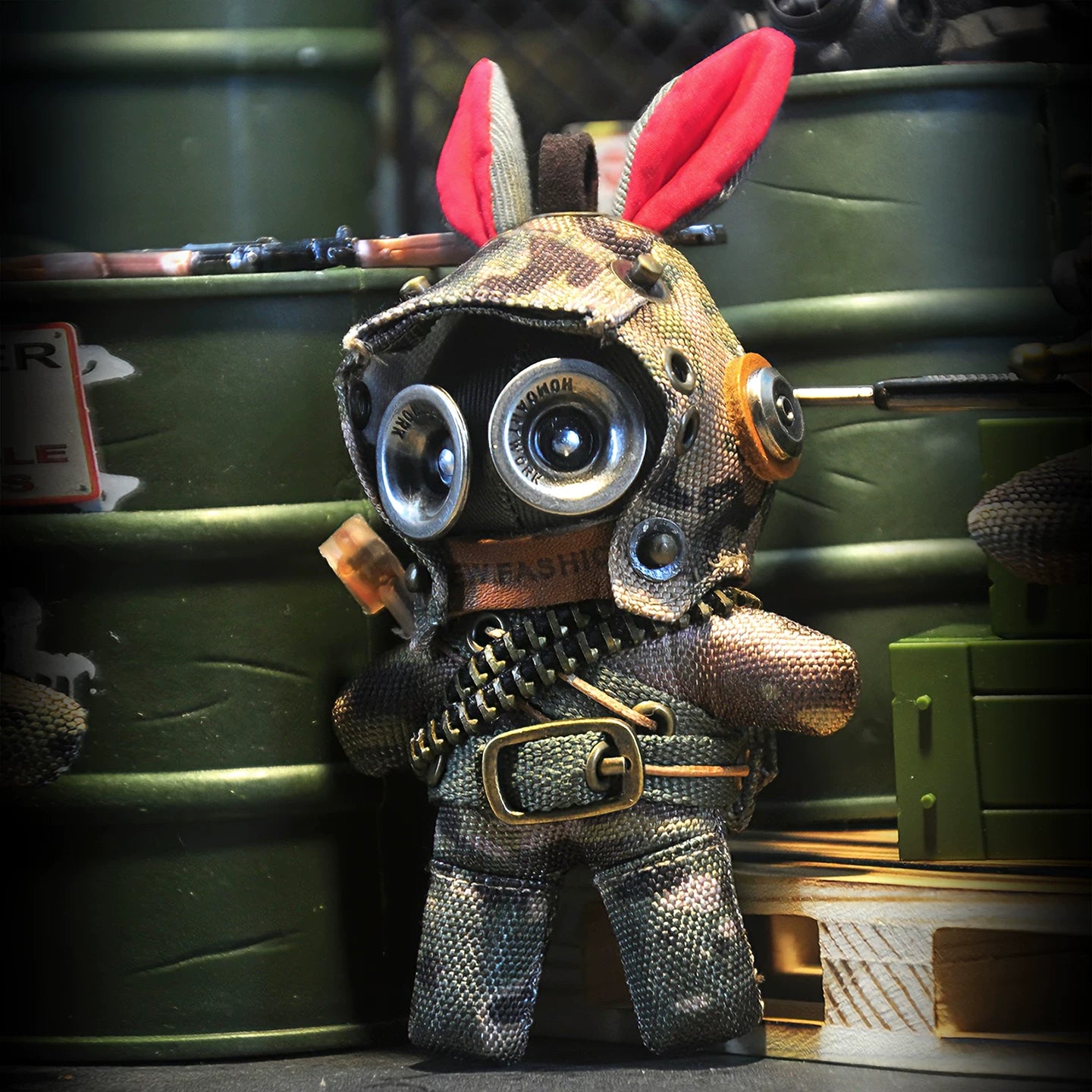 Bunny figure in camouflage tactical gear with military utility harness. Gothic artisan dark art toy, macabre collectible.