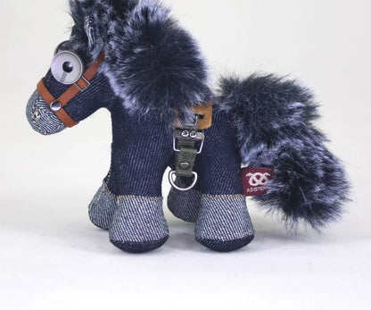 Indigo denim horse toy with contrasting lighter blue hooves and muzzle. Rustic folk art figurine, gothic artisan keychain.