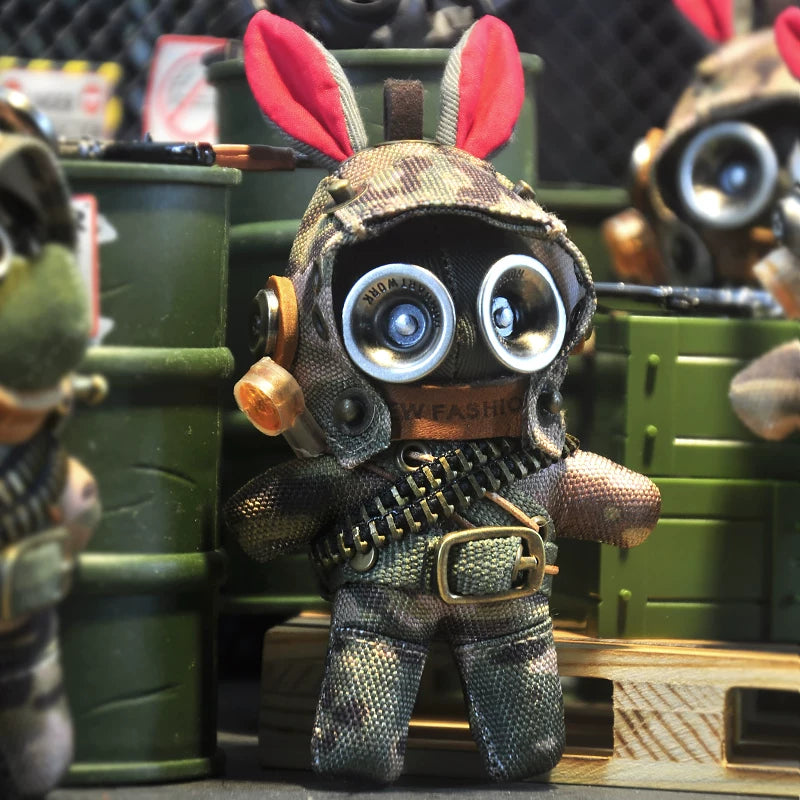 Gothic military bunny wearing camo tactical suit and goggled aviator helmet. Dark artisan macabre art toy, post-apocalyptic collectible.