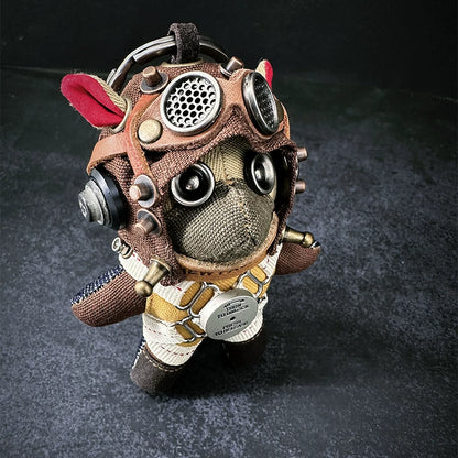 Aviator Pilot Dog Coffee Version — Mini Plush Keychain — side view showing leather bomber jacket texture, vintage goggle eyes, TURN KNOB TO UNLOCK metal clasp detail — Awhisker