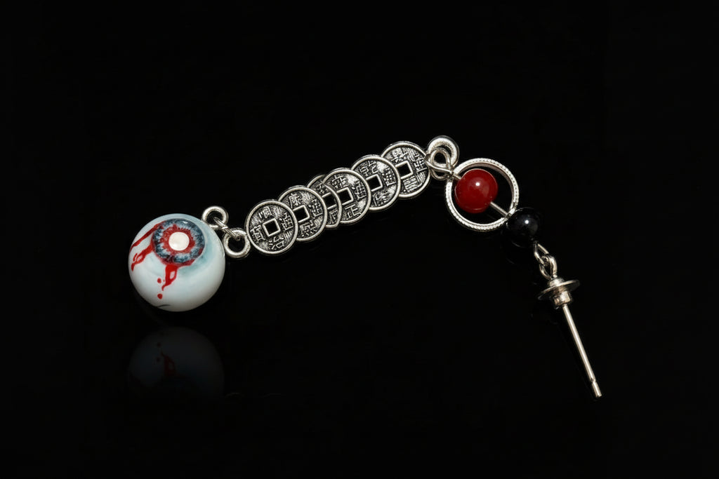 Single gothic bloodshot eyeball coin chain earring, red black bead accent, silver post on black