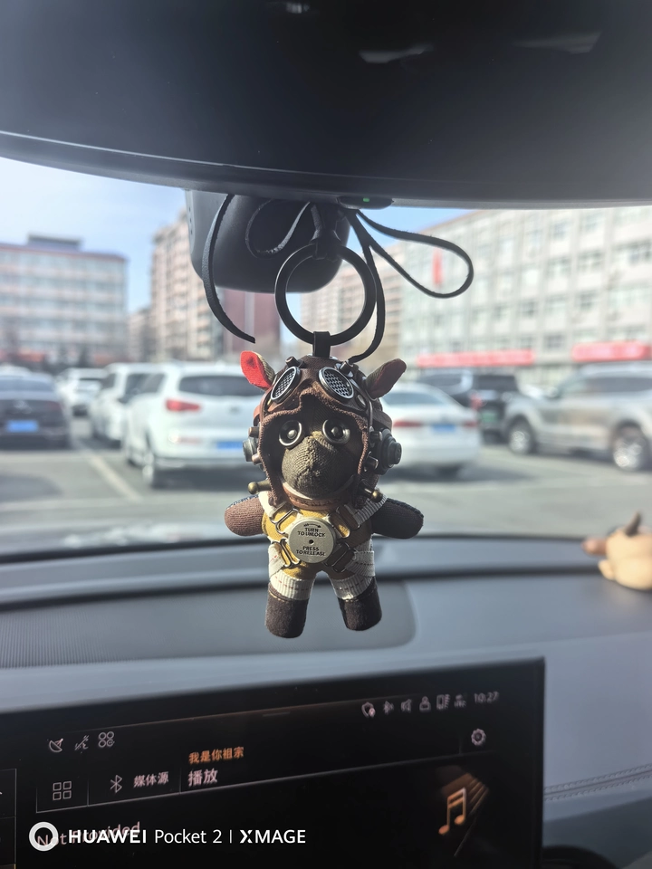 Aviator Pilot Dog Coffee Version — Mini Plush Keychain — styled worn view showing keychain on backpack loop, dark gothic aesthetic, urban aviator outfit styling — Awhisker