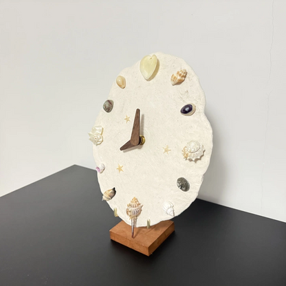 Seashell clock assembly kit with mineral crystal and natural shell components. Dark artisan craft materials, gothic decor DIY kit.