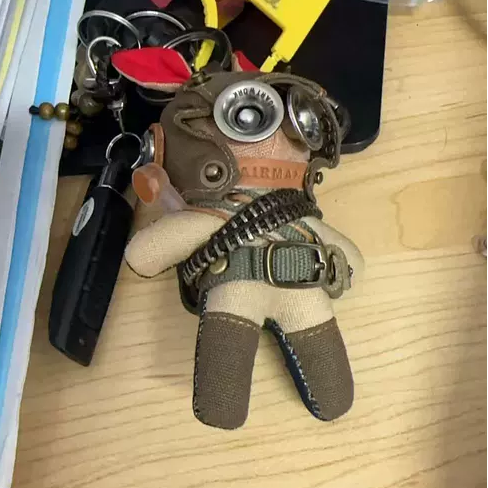 Military bunny duo in dark tactical gear with ammunition bandoliers and utility belts. Dark wasteland aesthetic, gothic art toy, artisan collectible.